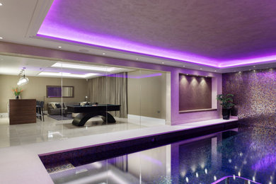 Photo of a contemporary swimming pool in Kent.