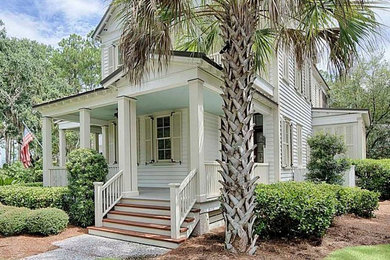 Photo of a mid-sized traditional two-storey white exterior in Atlanta.