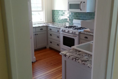 This is an example of a medium sized traditional kitchen in Other.