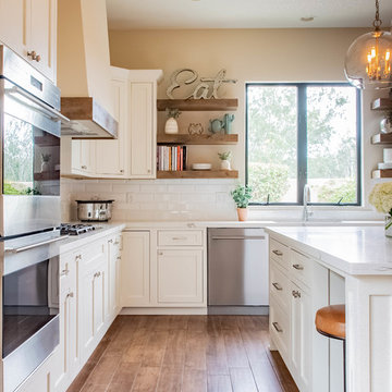 All-new white kitchen cabinetry and kitchen island