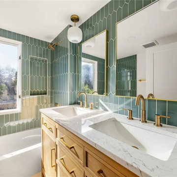 Luxurious details in gold complement the geometric green palette for a refined, 