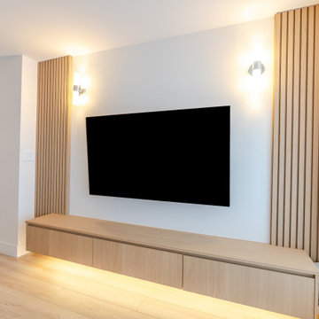 Floating Media Console with Wood Slat Accent Wall – Woodcroft Condo Renovation, 
