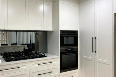 White modern shaker style kitchen cabinets