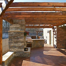 outdoor pergola, kitchen, fireplace