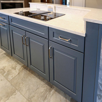 Two Tone Blue and Light Gray Kitchen with Tiled Island