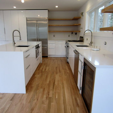 EAST HAMPTON 2 1/4" RED OAK INSTALLED & FINISHED W BONA AMBERSEAL AND TRAFFIC HD