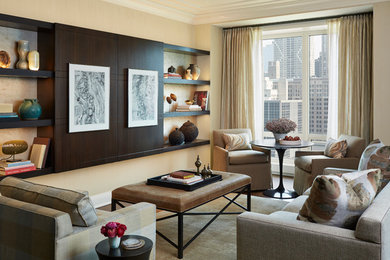 Example of a mid-sized transitional open concept dark wood floor and brown floor family room design in Chicago with yellow walls, no fireplace and a concealed tv