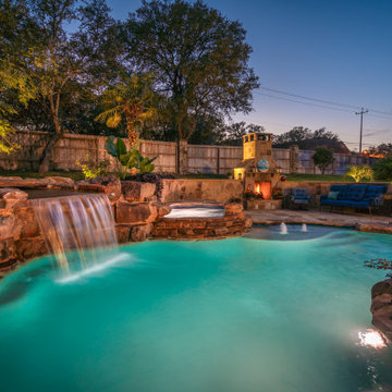 Freeform Pool with Negative Edge, Grotto, and Spa