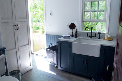 Example of a country laundry room design in New York