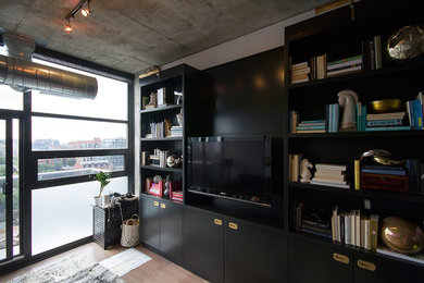 Example of a small urban loft-style living room design in Toronto