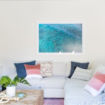 Boho Coastal Family Room with White Sectional and Rustic Wood Coffee Table