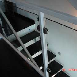 Steel stairs with glass panel - Products