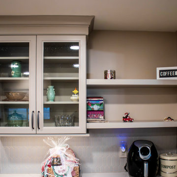 Two-Tone Neutral Kitchen with Quartz Countertop and Soho Picket Backsplash