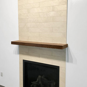 Tile wall install for fireplace