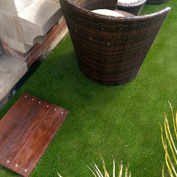 South Loop Balcony | High Density Turf & Ipe Landing w/ stainless steel accents