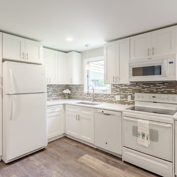 White Cabinets w/ Bar Height Peninsula