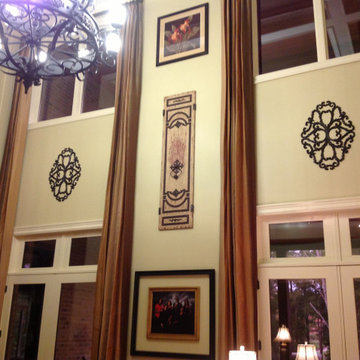 Tall luscious long panels enhance with a small bronze rod