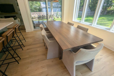 Example of a minimalist dining room design in Detroit