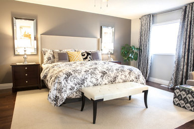 Transitional dark wood floor bedroom photo in Toronto with gray walls