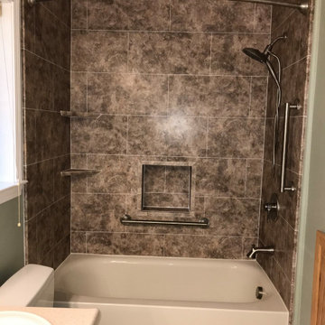 Madiera Granite shower with Roman Block simulated tile