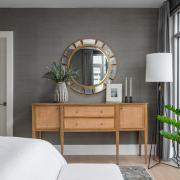 Moody Primary Bedroom with Floral Grasscloth Wallpaper Green Velvet Bed Deep War