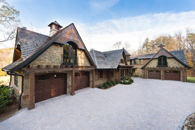 This is an example of a huge rustic full sun courtyard brick landscaping in Other for summer.
