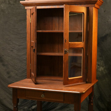 Trim Repair and Full Restoration: Documented 1894 Bookcase on Table