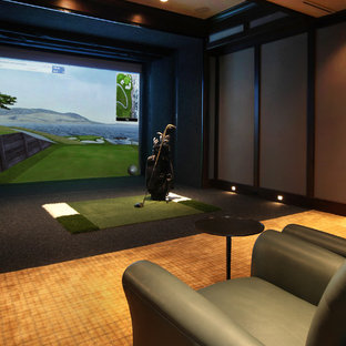 Inspiration for a large timeless enclosed carpeted home theater remodel in Omaha with gray walls and a projector screen