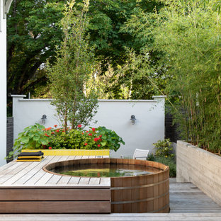 Outdoor shower deck - small modern backyard ground level outdoor shower deck idea in Portland with no cover