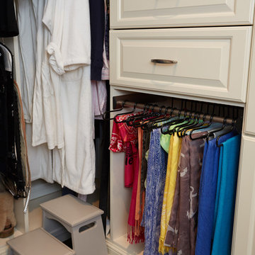 Traditional highly-functional custom women's walk-in closet