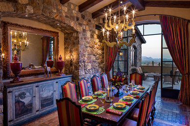 Example of a tuscan dining room design in Phoenix