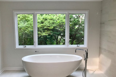 Minimalist freestanding bathtub photo in Chicago