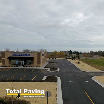 Asphalt paving, striping & concrete curve
