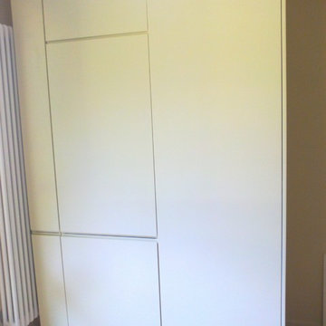 Cucina con top in Pral e lavello ricavato