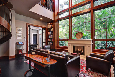 Example of a large transitional formal and open concept dark wood floor living room design in Miami with gray walls, a standard fireplace and a plaster fireplace