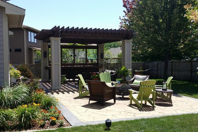 Large gray two-story exterior home photo in Other