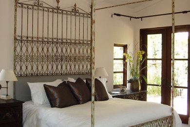 Example of a transitional bedroom design in Other