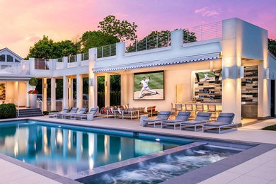Inspiration for a large contemporary pool remodel in Philadelphia