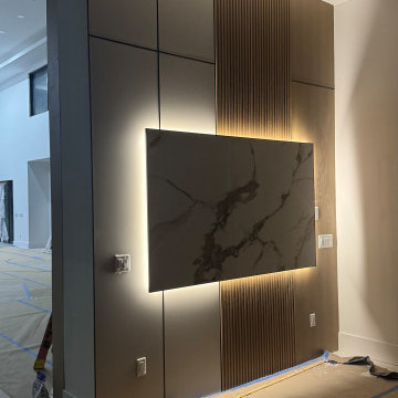 Modern Living Room with Custom TV Wall & Staircase Feature