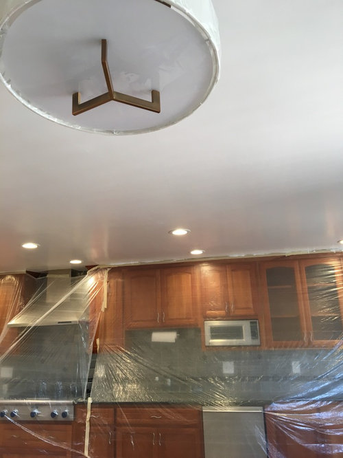 Antique brass faucet with a stainless steel sink?