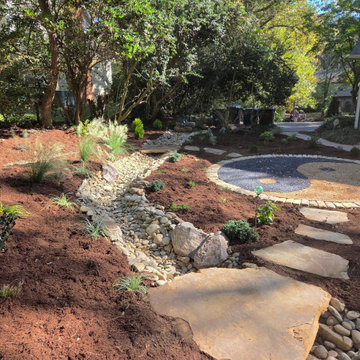 Yin-yang meditation garden with dry creek bed
