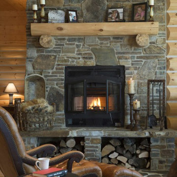 Wood Burning Fireplace with wood storage below log home
