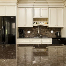 beige cabinets, dark countertops