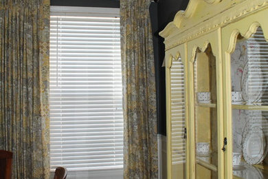 Example of a transitional dining room design in Detroit