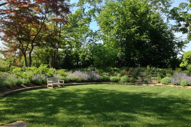 Design ideas for a huge eclectic backyard landscaping in New York.