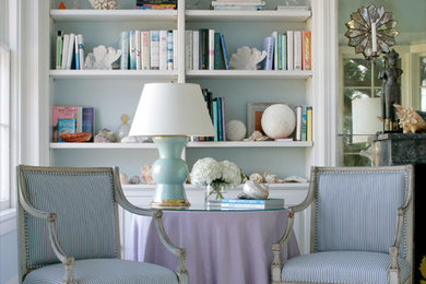 Inspiration for a large coastal living room remodel in New York with blue walls and no fireplace