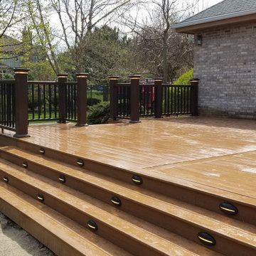 Composite deck with composite railing and lighting