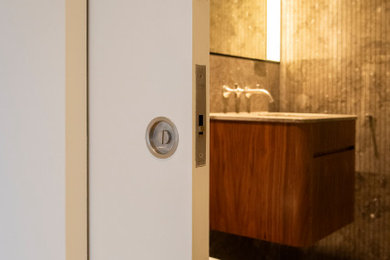 Inspiration for a modern cloakroom in Other.