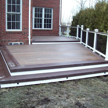 TREX TRANSCENDS SPICED RUM WITH VINTAGE LANTERN BORDER & WHITE TREX RAILING