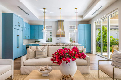 Example of a beach style living room design in Miami
